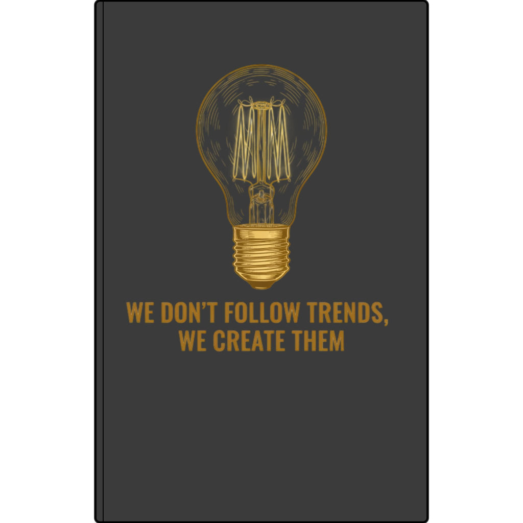 Engraved Vegan Leather Journal — 'We Don't Follow Trends, We Create Them' Lightbulb Notebook Printify